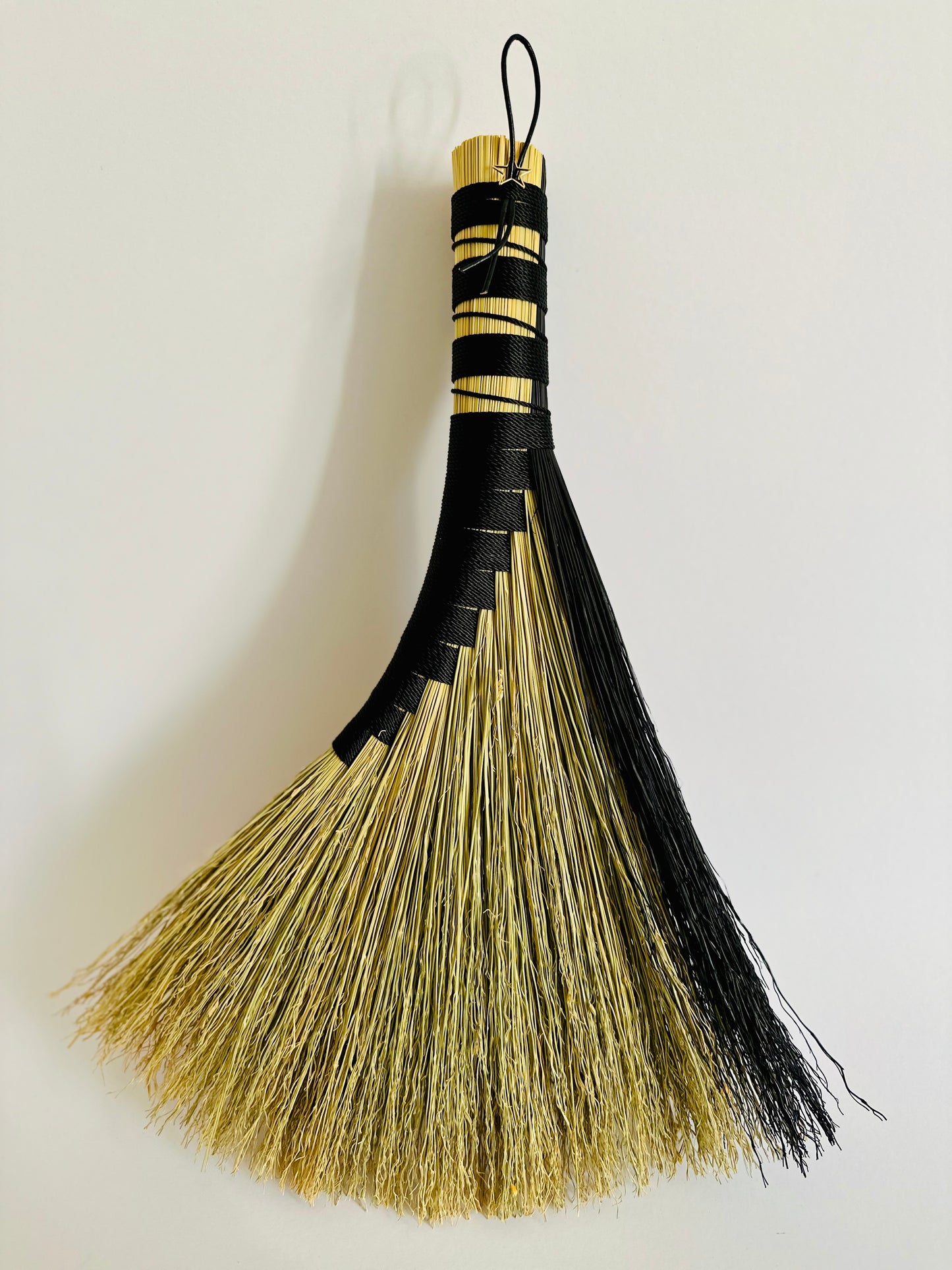 Hens Wing Handbroom - Black Edge