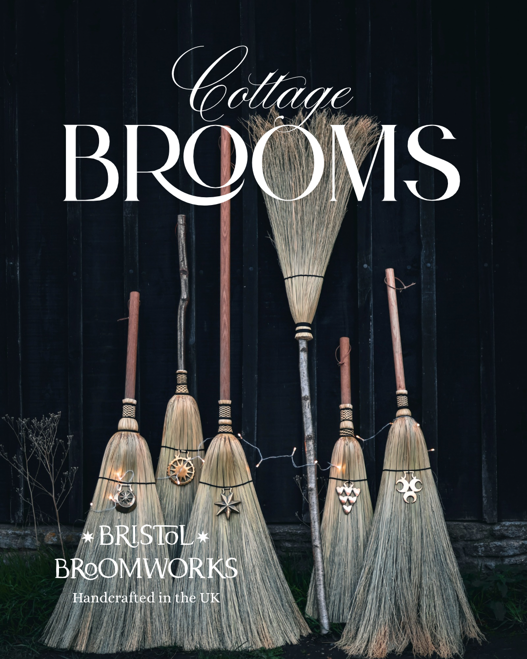 Collection of handcrafted brooms with 'Cottage Brooms' and 'Bristol Broomworks' branding on a dark background.