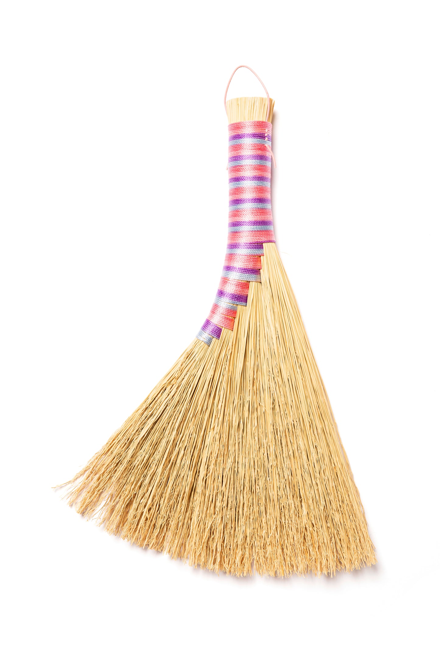 Bright pink blue and purple striped handmade hand broom with natural broomcorn, colourful heritage craft by Bristol Broomworks Somerset UK